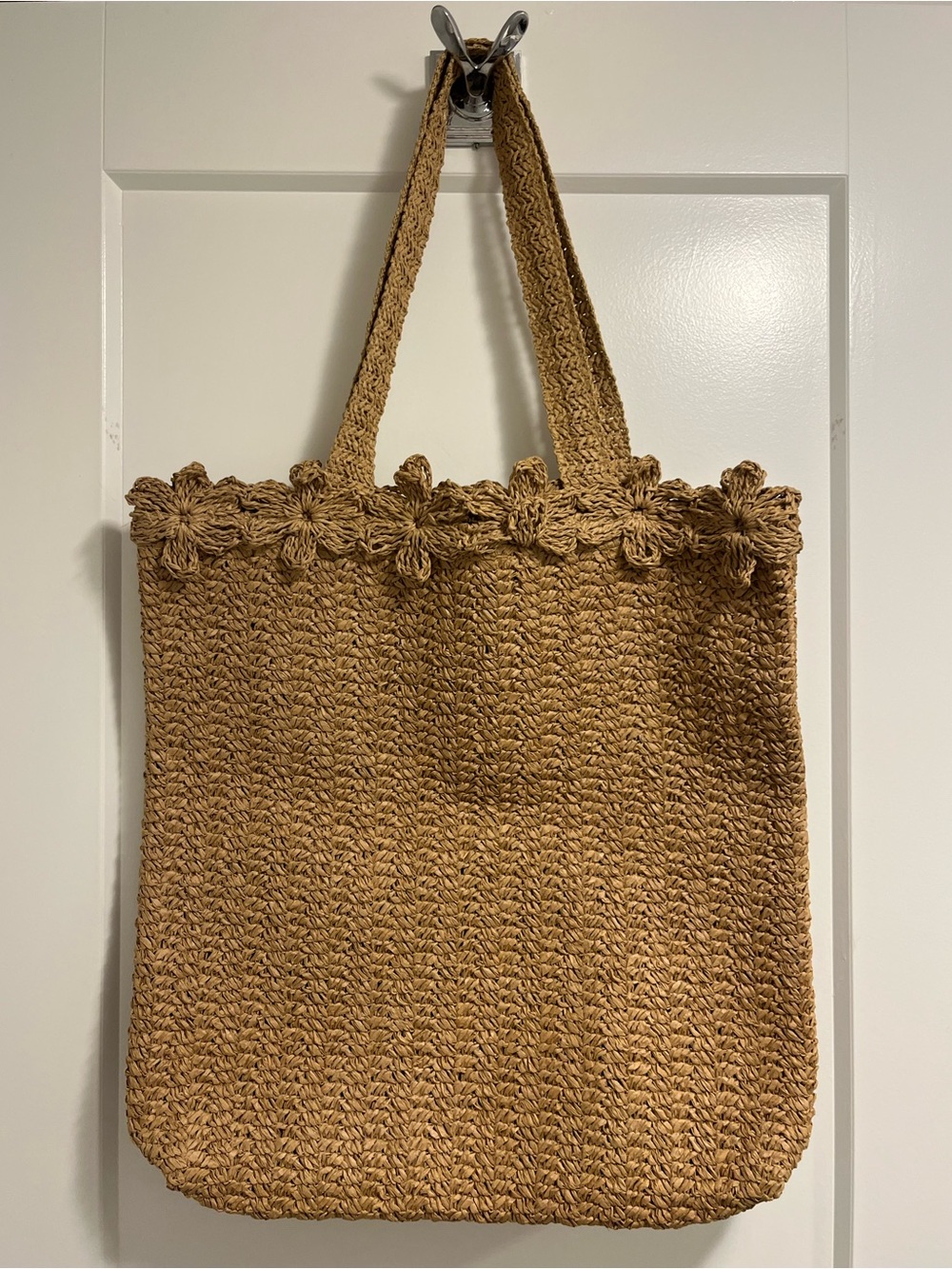Straw Crochet Flower Tote Bag in Tan with Flower details.